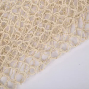 Close-up image of big hole cotton net mesh material, highlighting its texture and breathability as a material option for various bags and storage solutions.