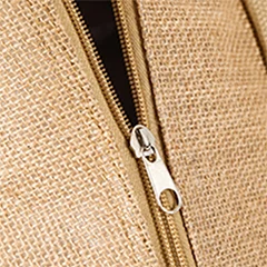 Close-up of the zipper on a jute bag, demonstrating the optional zipper closure feature.