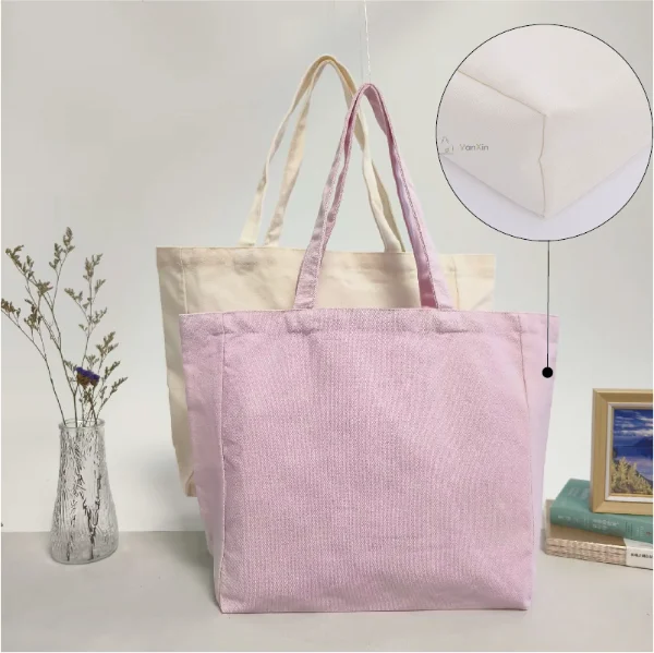 6 Must-Have Canvas Bags for Powerful Brand Promotion 3 Two canvas bags with gussets, one in natural color and the other in pink.