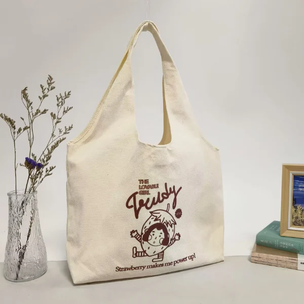 6 Must-Have Canvas Bags for Powerful Brand Promotion 6 A unique canvas bag shaped like a vest, designed for both shoulder carrying and hand carrying.