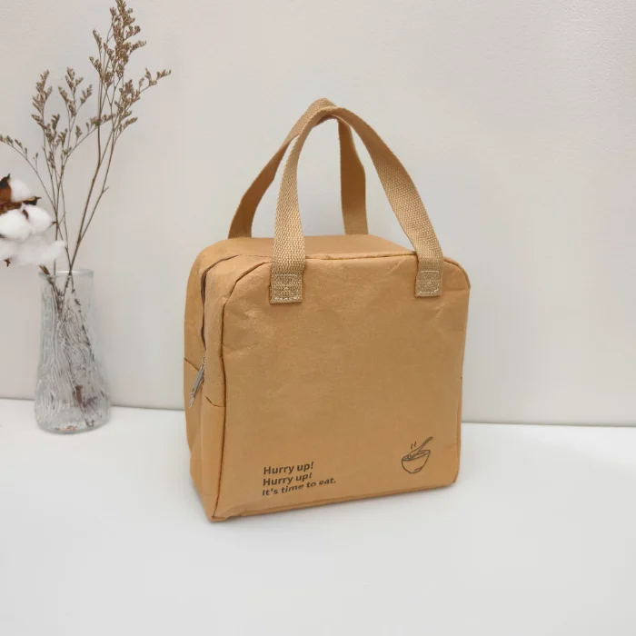 A square-shaped brown washable kraft paper cooler bag with two handles and a zipper closure at the top, showcasing customizable options for size, material, and logo