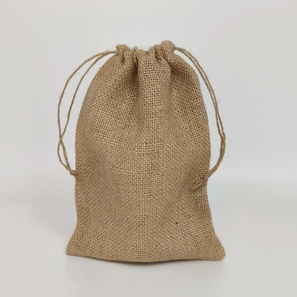 Natural jute drawstring bag with rustic texture for eco-friendly packaging