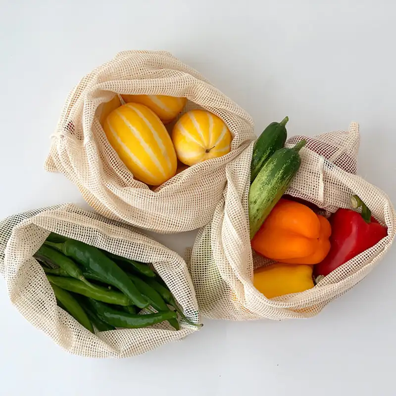 three cotton mesh drawstring bags