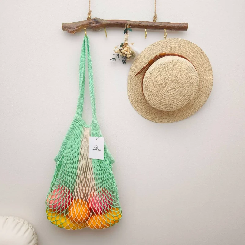 Image of a two-tone cotton mesh produce bag, showcasing its design and color scheme