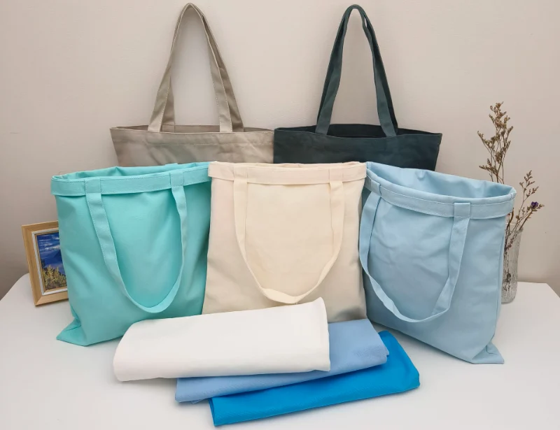 Canvas bags VS Leather Bags - A variety of canvas bag samples showing lightweight, eco-friendly designs in different shapes and sizes.