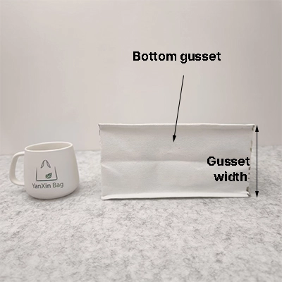 Flat Tote Bags VS Bottom Gusset Tote Bags VS All Side Gusset Tote Bags: A Comprehensive Comparison 7 Flat Tote Bags VS Bottom Gusset Tote Bags VS All Side Gusset Tote Bags showcasing the bottom angle of a all side gusset tote bag