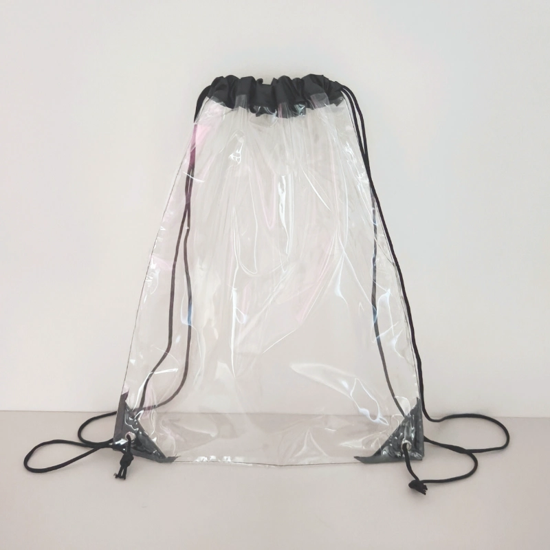 Clear PVC drawstring bag front view showing transparent body and white drawstring closure