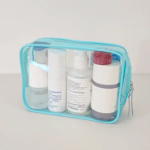 Hot sale bule clear PVC vinyl cosmetic bag angled front view showing depth and glossy surface