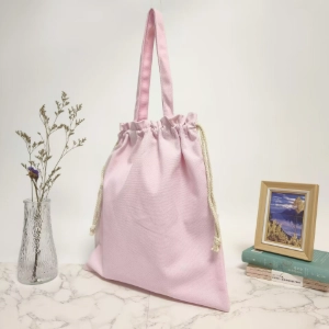 Side view of a pink drawstring bag as shown in The Ultimate Guide to Choosing the Best Custom Drawstring Bag