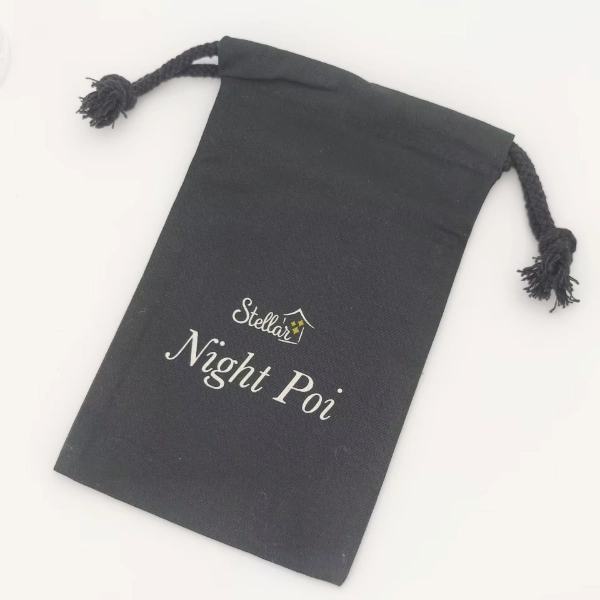black canvas gift bag with drawstring logo print flat lay