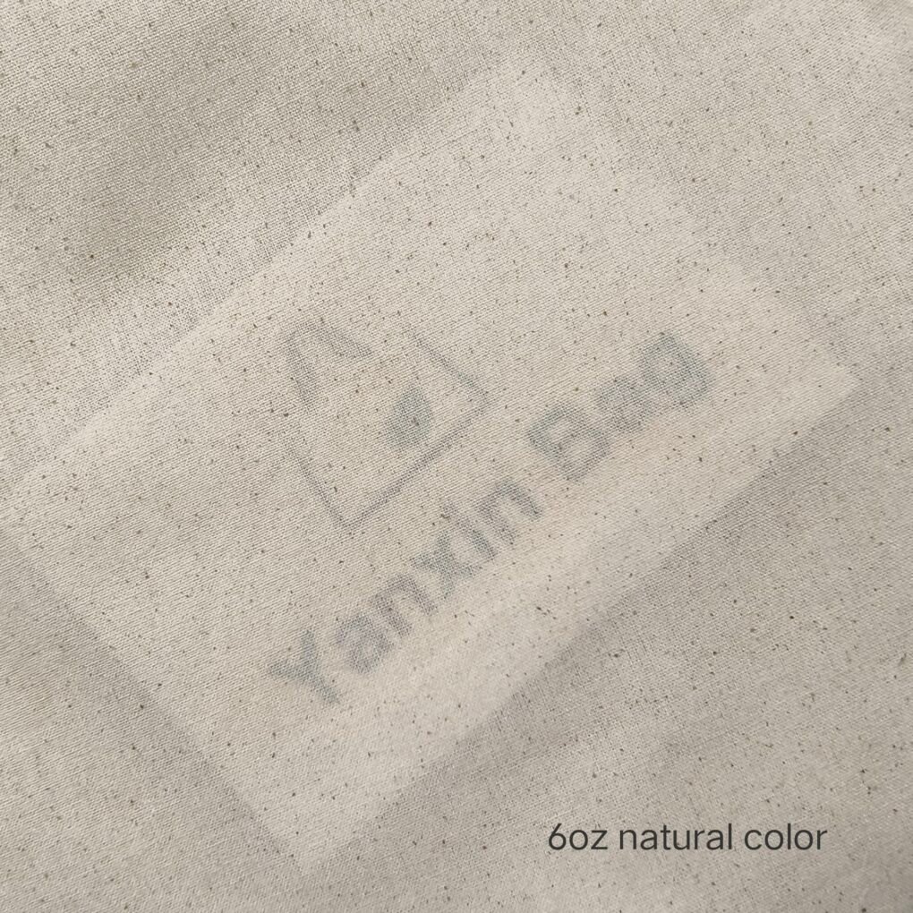 Cotton fabric texture used in blog “Cotton VS Polyester: Which is Better for Bags?”