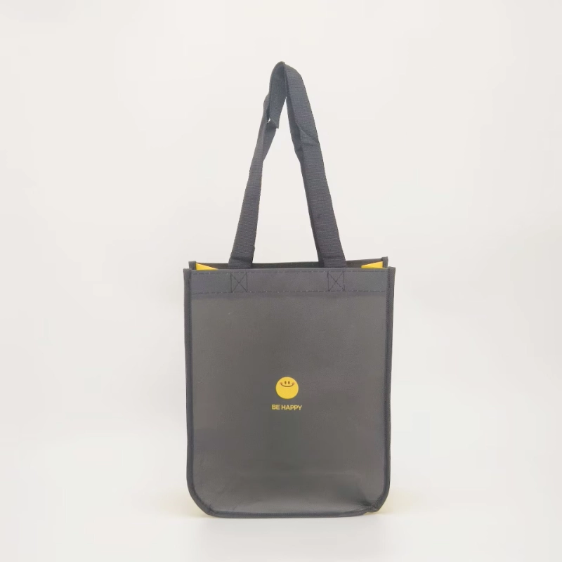 Black waterproof non-woven bag with rounded corners, shown in front view, customizable in size, material, style, and printing.