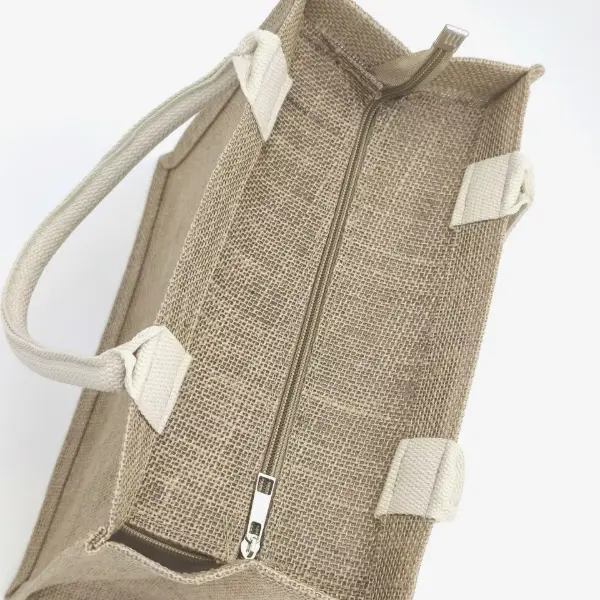 Natural jute tote bag with white cotton handles and top zipper closure, shown from a top-down angle, customizable in size, material, style, and printing.