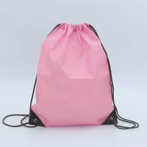 Front view of a pink drawstring backpack with black drawcords and reinforced corners, customizable in size, material, style, and printing.