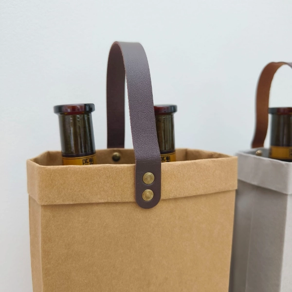wine bottle bag close up leather handle detail