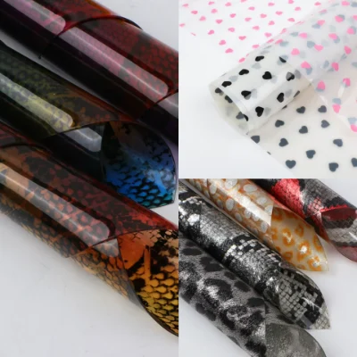 Printed pattern PVC rolls with leopard, snake, and heart designs for clear bags