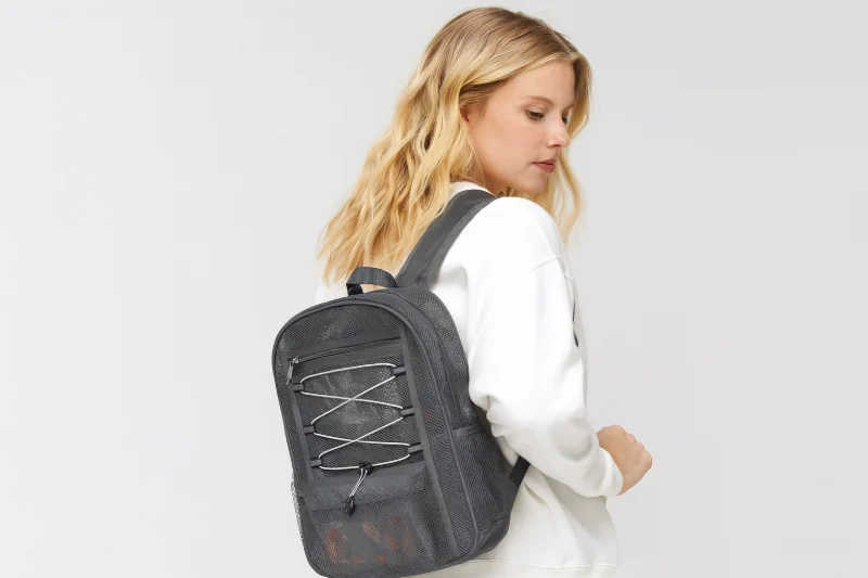 Compact Mesh Backpack in Use for Drawstring Bag vs Backpack Comparison