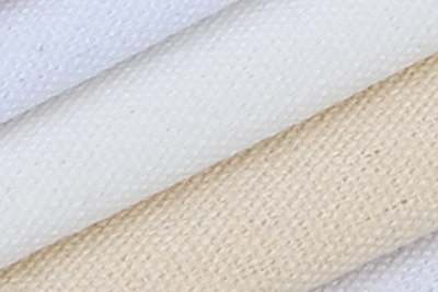cotton and canvas fabric options in white and beige colors showing different textures and weights
