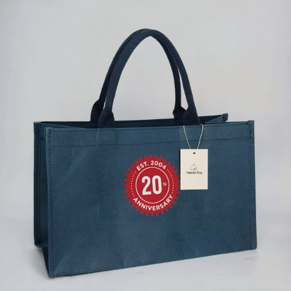 A structured washable kraft tote bag with short handles, standing upright against a plain background.