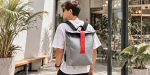 A person wearing a modern backpack outdoors, illustrating Why Global Buyers Prefer China-Made Tyvek Bag.