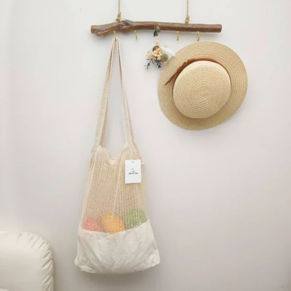 Front view of cotton mesh grocery bag, also used as a beach tote, in breathable mesh material