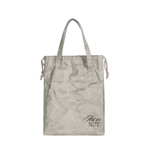 Tyvek drawstring bag with handles in grey crinkled texture and dual carry options
