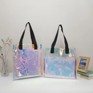 Two clear shoulder bags with black straps displayed side by side, illustrating Top-Selling Clear Bag Styles for B2B in 2026.