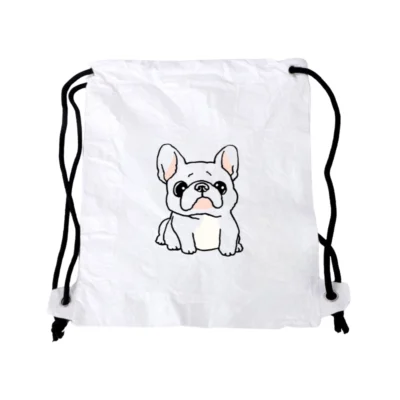 White Tyvek double-cord backpack drawstring bag with black cords and a cartoon bulldog illustration on the front.