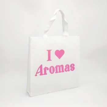 Close-up of a white non-woven bag with pink lettering and heart graphic, customizable in size, material, style, and printing.